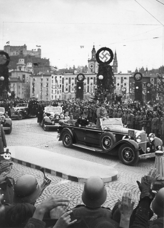 Adolf Hitler crosses Salzburg in his Mercedes